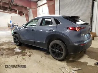 2023 Mazda CX-30 S Carbon Edition with VIN 3MVDMBCM7PM535140, listed as a Copart auction lot 44746645 with 51,810 mi miles and Clean Title. Bid and sale history available at DreamBid. Image 2.