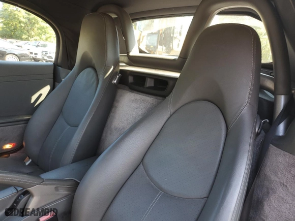 2011 Porsche Boxster with VIN WP0CA2A86BS710649, listed as a Copart auction lot 83767034 with 100,401 mi miles and Salvage Title. Bid and sale history available at carsss.com. Image 10.
