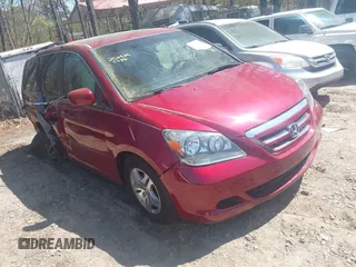 2005 Honda Odyssey EX-L with VIN 5FNRL38755B118345, listed as a IAAI auction lot 41806386 with 247,502 mi miles. Bid and sale history available at carsss.com. Image 1.
