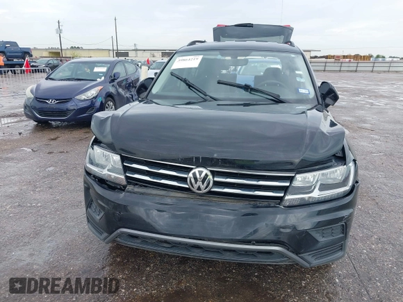 2021 Volkswagen Tiguan SE z VIN 3VV3B7AX7MM004286, wystawiony jako IAAI lot #39864219 z przebiegiem 67 429 mil mil oraz . Historia ofert i sprzedaży dostępna na DreamBid. Obrazek 12.