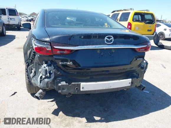 2020 Mazda 6 Sport with VIN JM1GL1UM2L1519932, listed as a IAAI auction lot 41712367 with 83,497 mi miles and . Bid and sale history available at DreamBid. Image 6.