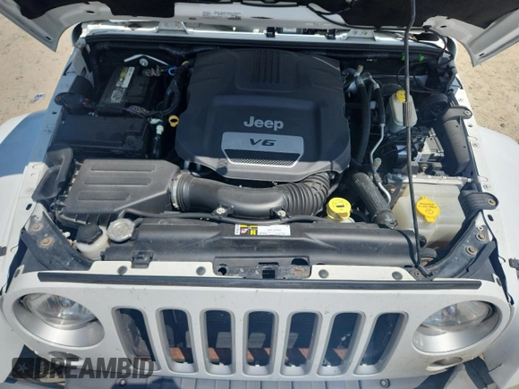2016 Jeep Wrangler Unlimited Sahara с VIN 1C4HJWEG3GL346528, выставлен на аукционе Copart как лот 65092755 с пробегом 127 393 миль миль и Списание • Salvage title. История ставок и продаж доступна на DreamBid. Изображение 12.