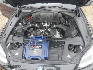 2014 BMW M6 with VIN WBSLX9C58ED160558, listed as a IAAI auction lot 41553209 with 154,789 mi miles. Bid and sale history available at carsss.com. Image 10.