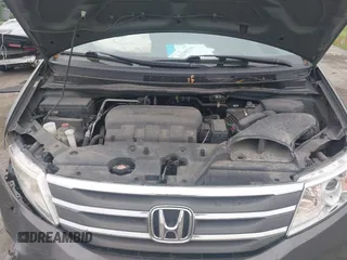 2011 Honda Odyssey EX-L with VIN 5FNRL5H64BB029087, listed as a IAAI auction lot 42508764 with 214,705 mi miles and . Bid and sale history available at DreamBid. Image 10.