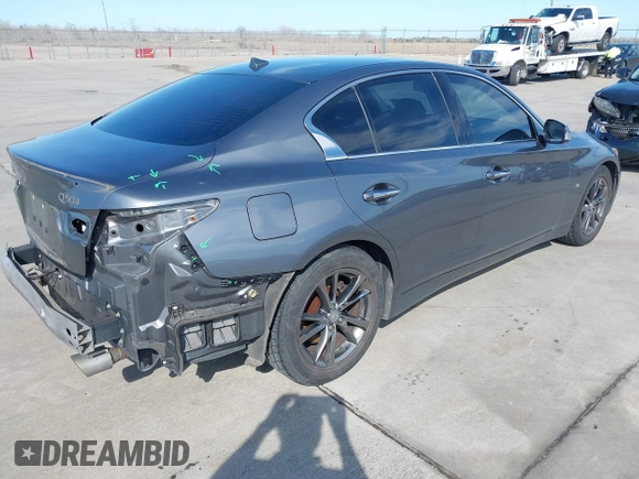 2015 Infiniti Q50 Premium with VIN JN1BV7AP0FM355933, listed as a IAAI auction lot 41684066 with 116,230 mi miles and . Bid and sale history available at DreamBid. Image 4.