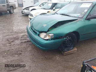 1998 Toyota Corolla VE with VIN 1NXBR12E6WZ094363, listed as a IAAI auction lot 41465384 with 265,919 mi miles and . Bid and sale history available at DreamBid. Image 6.