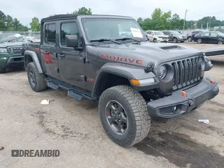 2021 Jeep Gladiator Mojave with VIN 1C6JJTEG8ML528311, listed as a IAAI auction lot 42682936 with 35,541 mi miles and . Bid and sale history available at DreamBid. Image 1.