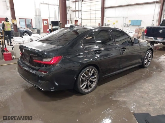 2020 BMW 3 Series M340i with VIN WBA5U7C05LFH82599, listed as a IAAI auction lot 41844916 with 51,533 mi miles. Bid and sale history available at carsss.com. Image 4.