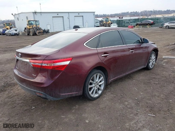 2013 Toyota Avalon XLE with VIN 4T1BK1EB4DU029014, listed as a IAAI auction lot 41689404 with 130,297 mi miles. Bid and sale history available at carsss.com. Image 4.