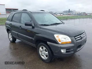 2005 Kia Sportage LX z VIN KNDJF723557101942, wystawiony jako IAAI lot #42316853 z przebiegiem 143 431 mil mil oraz . Historia ofert i sprzedaży dostępna na DreamBid. Obrazek 1.
