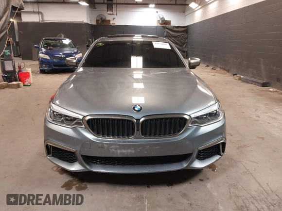 2020 BMW 5 Series M550i xDrive with VIN WBAJS7C00LCD83735, listed as a IAAI auction lot 41478682 with 39,299 mi miles and . Bid and sale history available at DreamBid. Image 12.