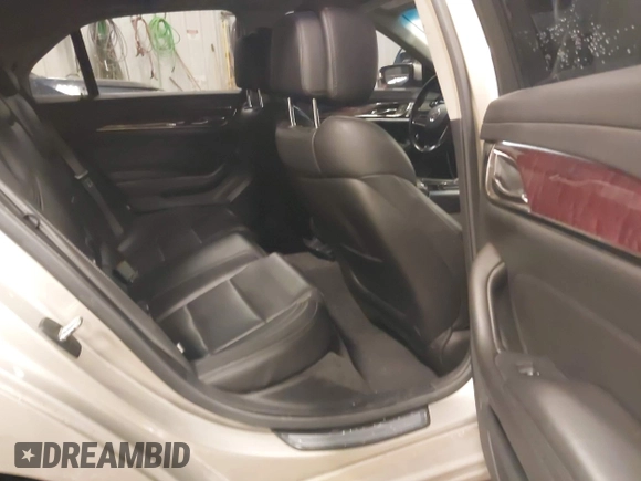 2014 Cadillac CTS Luxury AWD with VIN 1G6AX5S3XE0197628, listed as a IAAI auction lot 41400988 with 144,026 mi miles and . Bid and sale history available at DreamBid. Image 8.
