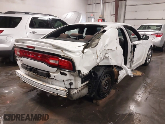2013 Dodge Charger SE with VIN 2C3CDXBG2DH726467, listed as a IAAI auction lot 38024398 with 232,387 mi miles and . Bid and sale history available at carsss.com. Image 6.