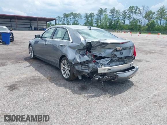 2019 Cadillac CTS Luxury RWD with VIN 1G6AR5SS4K0122114, listed as a IAAI auction lot 42556986 with 74,325 mi miles and . Bid and sale history available at DreamBid. Image 3.