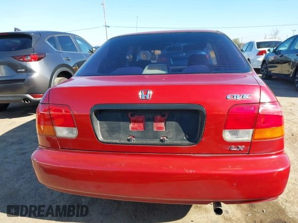 1997 Honda Civic LX with VIN 1HGEJ6678VL030963, listed as a IAAI auction lot 41880866 with 142,472 mi miles. Bid and sale history available at carsss.com. Image 16.