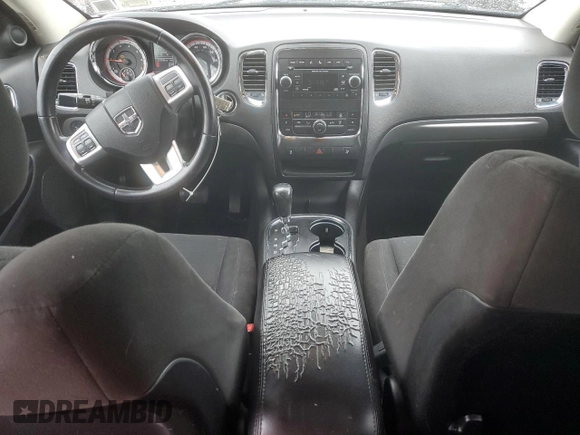 2012 Dodge Durango SXT with VIN 1C4RDJAG4CC106273, listed as a Copart auction lot 59767205 with 223,098 mi miles and Salvage title. Bid and sale history available at DreamBid. Image 8.