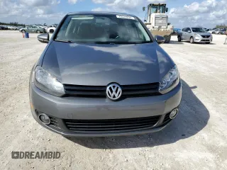 2014 Volkswagen Golf TDI w/Sunroof & Nav z VIN WVWDM7AJ7EW003715, wystawiony jako Copart lot #79524694 z przebiegiem Nie podano mil oraz Szkoda całkowita • Salvage title. Historia ofert i sprzedaży dostępna na DreamBid. Obrazek 5.