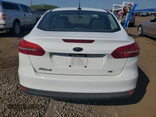 2017 Ford Focus SE with VIN 1FADP3F26HL313478, listed as a Copart auction lot 57078015 with 56,807 mi miles and Salvage title. Bid and sale history available at DreamBid. Image 6.