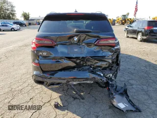 2022 BMW X5 xDrive40i with VIN 5UXCR6C09N9K20370, listed as a Copart auction lot 71387572 with 11,272 mi miles. Bid and sale history available at carsss.com. Image 6.