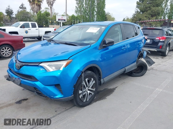 2018 Toyota RAV4 LE with VIN 2T3BFREV6JW740214, listed as a IAAI auction lot 42106349 with 105,831 mi miles and . Bid and sale history available at carsss.com. Image 6.