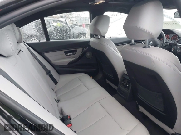2013 BMW 3 Series ActiveHybrid 3 with VIN WBA3F9C57DF483994, listed as a IAAI auction lot 41797778 with 92,313 mi miles. Bid and sale history available at carsss.com. Image 8.