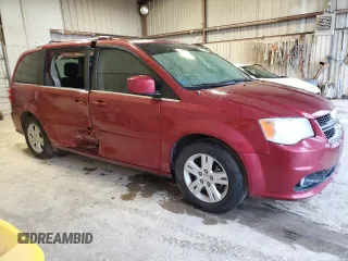 2011 Dodge Grand Caravan Crew with VIN 2D4RN5DG9BR606602, listed as a Copart auction lot 69881504 with 129,575 mi miles and Salvage Title. Bid and sale history available at DreamBid. Image 4.
