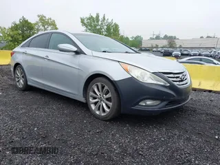 2013 Hyundai Sonata Limited z VIN 5NPEC4AC9DH762751, wystawiony jako IAAI lot #42261110 z przebiegiem 159 824 mil mil oraz . Historia ofert i sprzedaży dostępna na DreamBid. Obrazek 1.