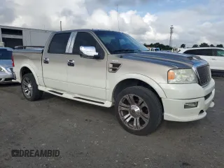 2005 Ford F-150 XLT with VIN 1FTPW14535FA79239, listed as a Copart auction lot 64672615 with 230,010 mi miles and Clean title. Bid and sale history available at DreamBid. Image 4.