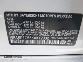 2019 BMW 3 Series 330i with VIN WBA5R1C55KAK12332, listed as a IAAI auction lot 41692035 with 13,657 mi miles and . Bid and sale history available at DreamBid. Image 9.