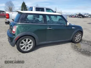 2011 MINI Hardtop S with VIN WMWSV3C55BTY24299, listed as a Copart auction lot 54725755 with 82,489 mi miles and Salvage Title. Bid and sale history available at DreamBid. Image 3.