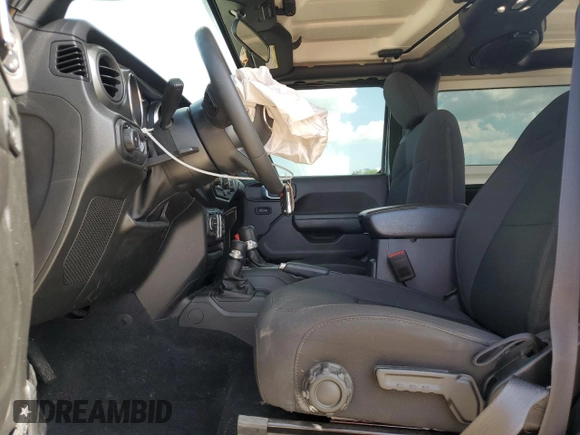 2023 Jeep Wrangler Sport S with VIN 1C4GJXAN7PW634914, listed as a Copart auction lot 63533355 with 39,490 mi miles and Salvage title. Bid and sale history available at DreamBid. Image 7.