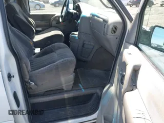 1999 Chevrolet Astro z VIN 1GNEL19W7XB186653, wystawiony jako IAAI lot #42432120 z przebiegiem 413 792 mil mil oraz . Historia ofert i sprzedaży dostępna na DreamBid. Obrazek 5.
