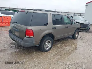 2003 Ford Explorer XLS z VIN 1FMZU72K63UA13640, wystawiony jako IAAI lot #41169432 z przebiegiem 212 849 mil mil oraz . Historia ofert i sprzedaży dostępna na DreamBid. Obrazek 4.