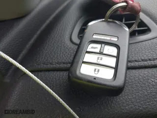 2017 Honda Pilot Touring with VIN 5FNYF6H95HB007854, listed as a IAAI auction lot 41955509 with 103,202 mi miles. Bid and sale history available at carsss.com. Image 11.