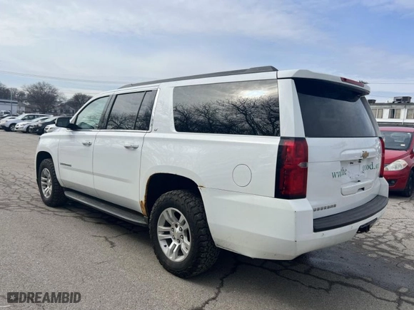 2016 Chevrolet Suburban LT with VIN 1GNSKHKC9GR311870, listed as a IAAI auction lot 41821574 with 245,820 mi miles. Bid and sale history available at carsss.com. Image 3.