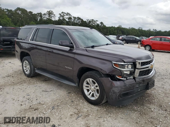 2015 Chevrolet Tahoe LS with VIN 1GNSCAKC4FR116004, listed as a Copart auction lot 54599375 with 87,645 mi miles and Salvage title. Bid and sale history available at DreamBid. Image 4.