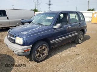 2001 Chevrolet Tracker z VIN 2CNBJ13C616955326, wystawiony jako Copart lot #64105184 z przebiegiem 138 156 mil mil oraz Tytuł czysty. Historia ofert i sprzedaży dostępna na DreamBid. Obrazek 1.