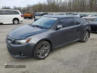 2011 Scion tC with VIN JTKJF5C71B3017022, listed as a Copart auction lot 52859865 with 220,603 mi miles and Salvage Title. Bid and sale history available at carsss.com. Image 1.