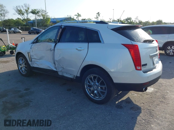 2015 Cadillac SRX Premium Collection with VIN 3GYFNDE32FS530357, listed as a IAAI auction lot 41976585 with 92,335 mi miles and . Bid and sale history available at carsss.com. Image 3.