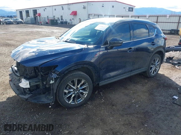 2019 Mazda CX-5 Signature with VIN JM3KFBEY5K0609063, listed as a IAAI auction lot 41802772 with 104,112 mi miles. Bid and sale history available at carsss.com. Image 18.