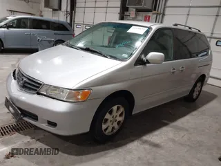 2003 Honda Odyssey EX with VIN 5FNRL18673B009670, listed as a IAAI auction lot 42130172 with 218,391 mi miles and . Bid and sale history available at DreamBid. Image 2.