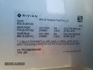 2024 Rivian R1S Adventure z VIN 7PDSGBBA5RN044560, wystawiony jako Copart lot #70594924 z przebiegiem 2449 mil mil oraz Szkody całkowita. Historia ofert i sprzedaży dostępna na DreamBid. Obrazek 13.