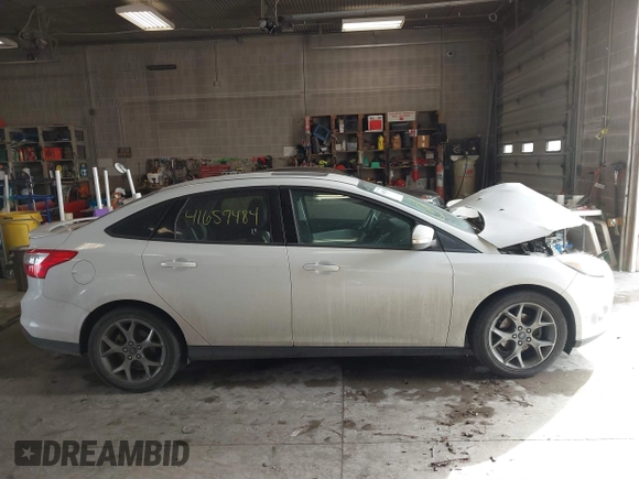 2013 Ford Focus SE with VIN 1FADP3F21DL306920, listed as a IAAI auction lot 41657484 with 172,116 mi miles. Bid and sale history available at carsss.com. Image 13.