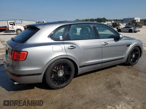 2019 Bentley Bentayga V8 z VIN SJAAM2ZV4KC024727, wystawiony jako Copart lot #80631684 z przebiegiem 38 304 mil mil oraz Nie do naprawy. Historia ofert i sprzedaży dostępna na DreamBid. Obrazek 4.