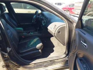 2013 Dodge Charger SE with VIN 2C3CDXBG9DH681172, listed as a IAAI auction lot 41761125 with 117,040 mi miles. Bid and sale history available at carsss.com. Image 5.