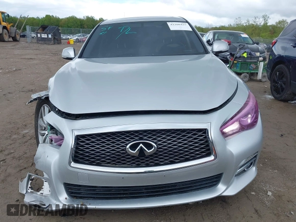 2015 Infiniti Q50 Premium z VIN JN1BV7AR8FM390785, wystawiony jako IAAI lot #42200437 z przebiegiem 94 841 mil mil oraz . Historia ofert i sprzedaży dostępna na DreamBid. Obrazek 12.