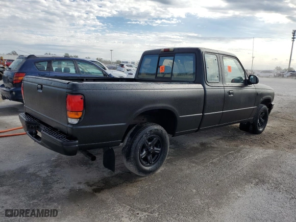 1996 Mazda B-Series 2WD Truck SE with VIN 4F4CR16U5TTM08135, listed as a Copart auction lot 86593474 with 127,430 mi miles and Salvage Title. Bid and sale history available at carsss.com. Image 3.