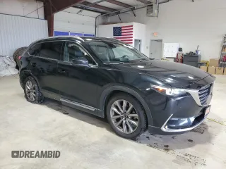 2021 Mazda CX-9 Carbon Edition with VIN JM3TCBDY7M0516272, listed as a Copart auction lot 62078735 with 81,424 mi miles and Salvage title. Bid and sale history available at DreamBid. Image 4.