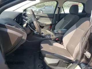 2013 Ford Focus SE z VIN 1FADP3F20DL330366, wystawiony jako Copart lot #59204595 z przebiegiem 163 305 mil mil oraz Szkoda całkowita • Salvage title. Historia ofert i sprzedaży dostępna na DreamBid. Obrazek 7.