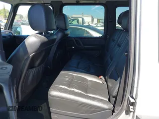 2002 Mercedes-Benz G-Class with VIN WDCYR49E02X129195, listed as a IAAI auction lot 41871996 with 200,945 mi miles. Bid and sale history available at carsss.com. Image 8.
